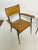 Pair of steel framed armchairs by Jacques Adnet, ca. late 1940s. These are covered in their original saddle tanned and...