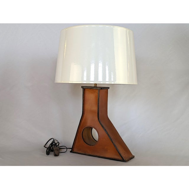 Designer: Unknown Dims.: 27.5" OAH Shade Dims.: 14" Top x 16" Bottom x 9.5" H Origin: France Circa: 1960's A glamorous...