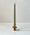 A small candlestick holder in patinated bronze. One side for a regular sized candle and the other for a taper candle. It...