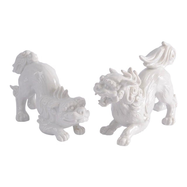 Mid 20th Century Pair of White Porcelain Foo Dogs / Blanc De Chine Guardian Lions For Sale
