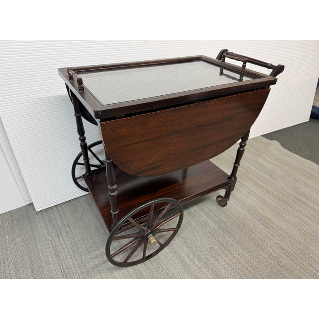 Design Plus Gallery presents a Vintage Tea Cart from The Paalman Furniture Company. The lovely expandable cart is full of...