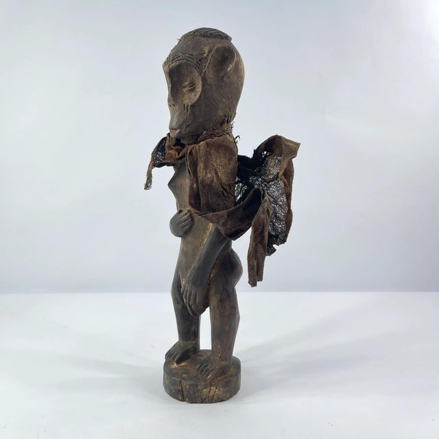 Carved wooden figure from the Mbaka people of the Democratic Republic of the Congo. Figures like this were created for...