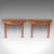 This is a pair of antique demi-lune tables. An English, flame mahogany and inlaid accent table in the Sheraton manner,...