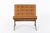This vintage mid century modern brown leather Barcelona chair designed by Mies van der Rohe for Knoll was manufactured in...