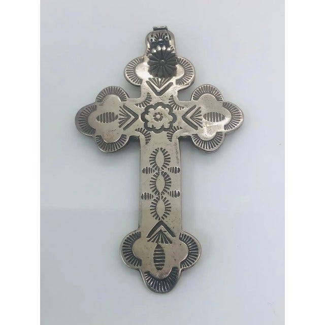 This stunning set of six handcrafted antique cross pendants showcases unique styles inspired by Native American design,...
