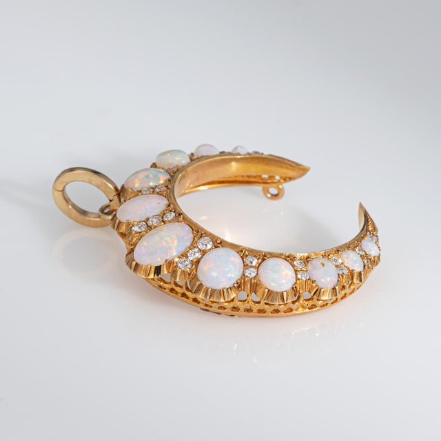 Elaborate antique Victorian diamond & opal crescent moon pendant crafted in 15 karat yellow gold (circa 1880s to 1900s) 24...