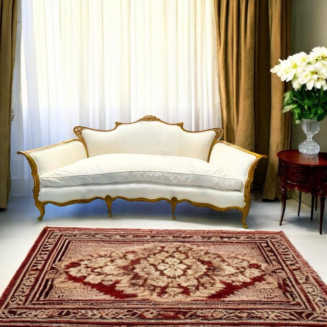 Description: Timeless French Provincial Intricate Hand-Carved Wood Framed Sofa With Off White Upholstery This exquisite...