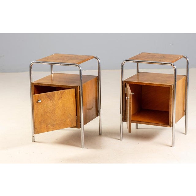 This pair of functionalist bedside tables originates from Czechoslovakia, dating to the 1930s–1940s. The design reflects...