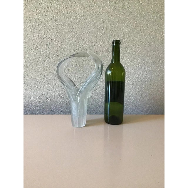 Vintage Modern Glass Sculpture. This piece of glass is a signed by the artist and is an abstract design. The color of this...