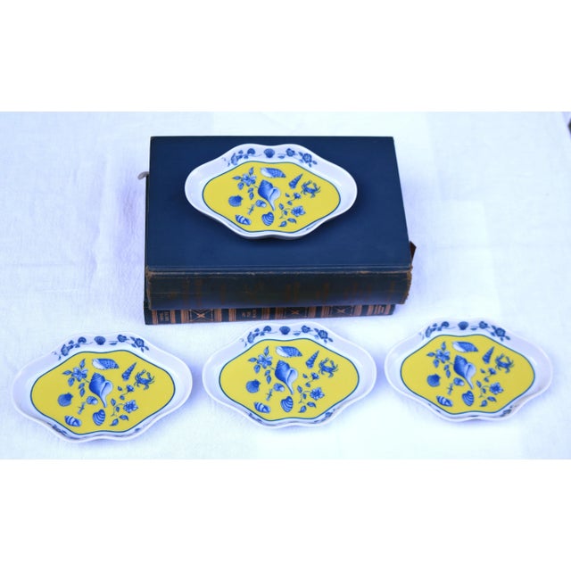 Light and bright with a beautiful coastal design of seashells, crabs and flowers, these dishes have a variety of uses....