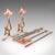 This is a superb antique fireside companion set, comprising a pair of French bronze andirons and a trio of fire tools in...