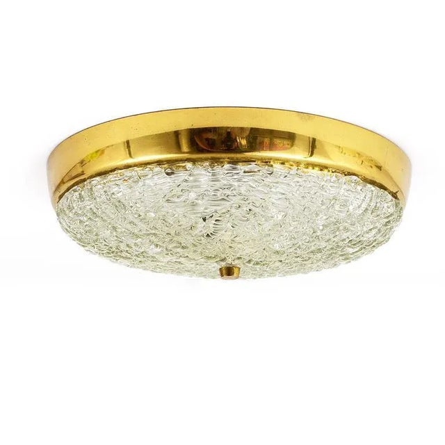 A beautiful modernist flush mount from the 1950s by kalmar austria. A charming light, made of solid textured glass on a...