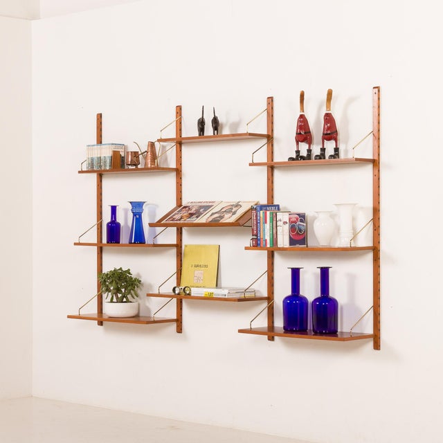 Poul cadovius teak shelving unit „royal" made in the 1950s-1960s in denmark. It has been fully renovated. the overall set...