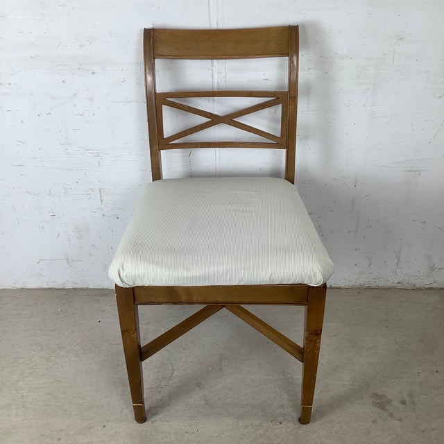 Elegant proportions and timeless craftsmanship define this vintage Neoclassical-style side chair, a refined seating piece...