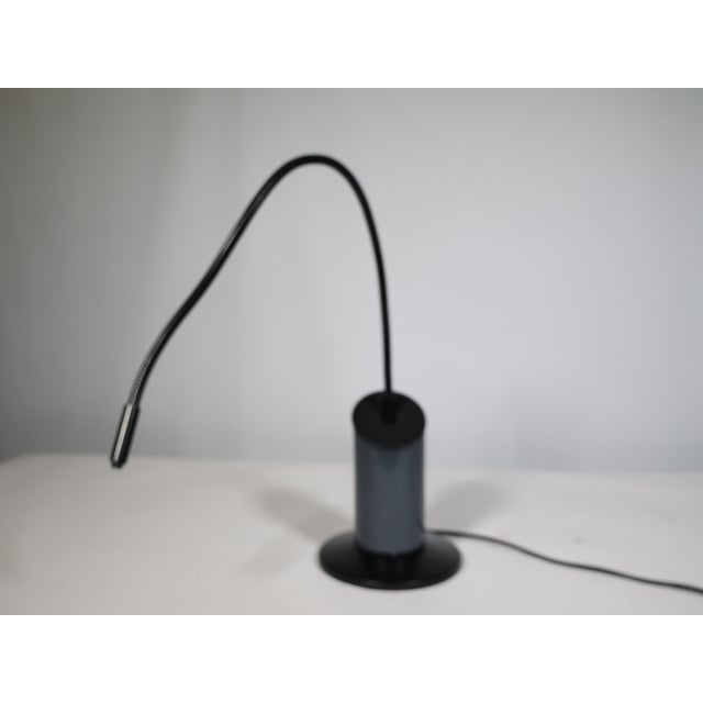 Zed table lamp by Tommaso Cimini for Lumina from the 1980s. Black and gray metal finish with a flexible arm and...