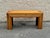 1970s console table in rattan construction with a geometric, stepped frame. The form is built from tightly bundled reed,...