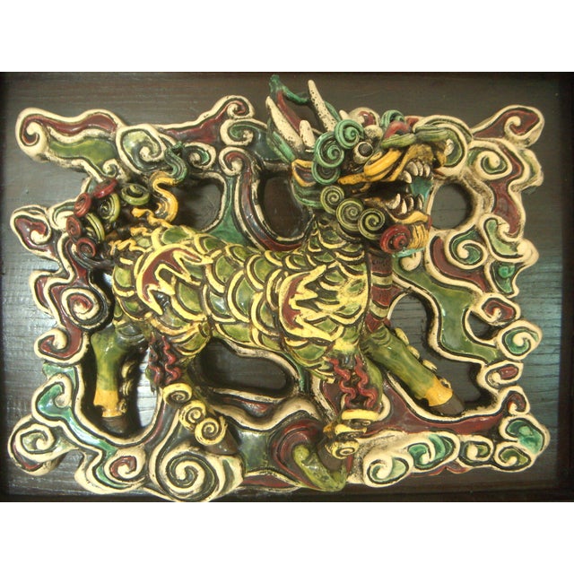 Magnificent Chinese Shiwan tile of Qilin (麒麟) mounted on an expensive custom wood frame with Chinese brass hanger....