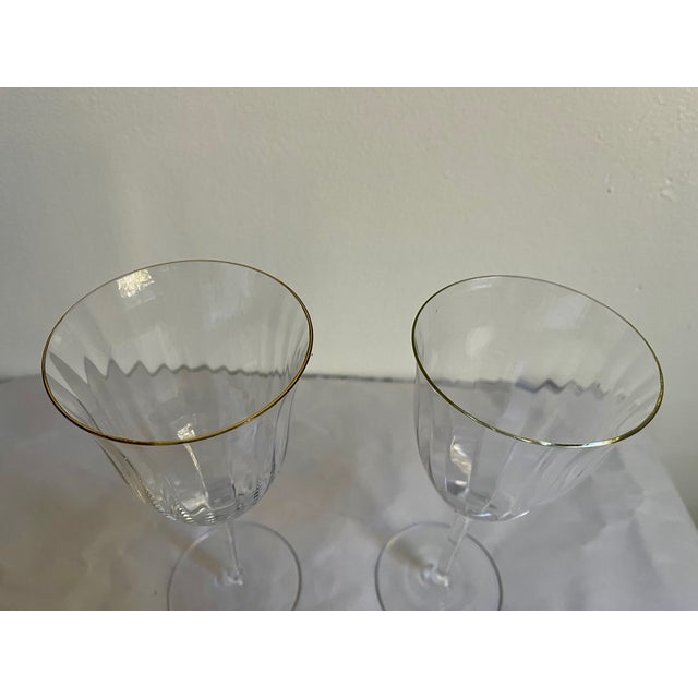 Gorham Crystal "Laurin Gold" water goblets from the 1980s/1990s. Gold trim with optic bowl and smooth stem. Good condition...
