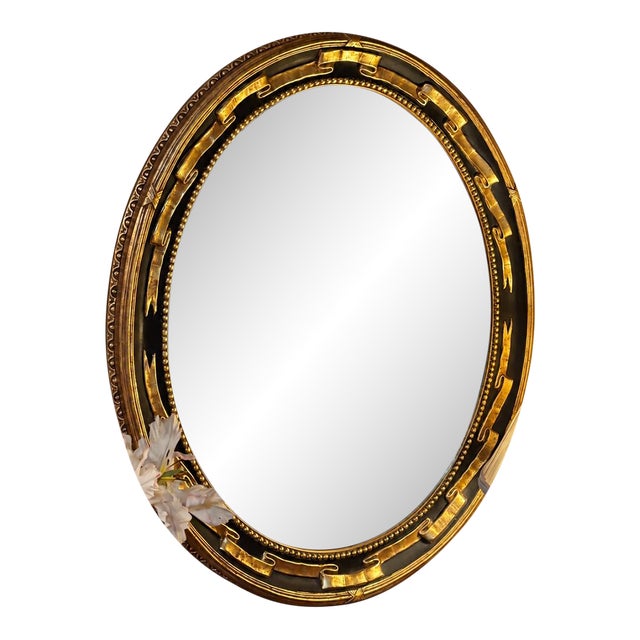 Vintage Federal Revival Black and Gold Parcel-Gilt Oval Wall Mirror For Sale