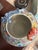 A vibrant vintage Chinese porcelain bowl or small jardinière, richly decorated in a dense all-over floral pattern in the...