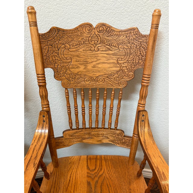 Gold Vintage Carved Solid Oak Pressed-Back Dining Chairs – Captain & Side Chair Pair For Sale - Image 8 of 9