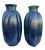 A pair of custom painted very large clay pots. The pots are very heavy and pretty big. as well They're handmade so one is...
