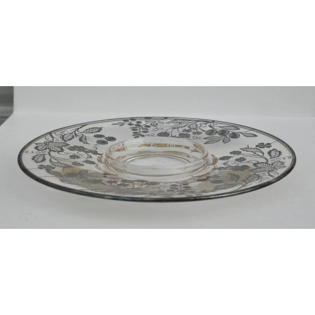 Vintage (1960's) Round Platter has an Art Nouveau Style. Made of Glass w/Silver Overlay of Fruit & Leaves. The...