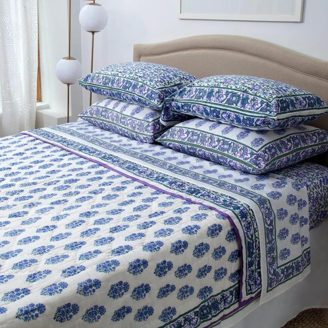 The elaborate Aria design features a traditional Indian all-over vine pattern in a fresh, modern color palette. A...