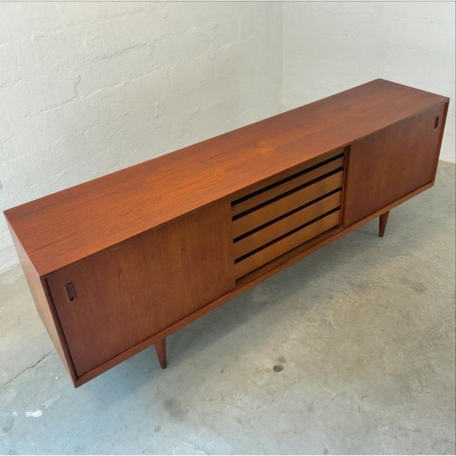 Dimensions: 89" L x 18 7/8" D x 31 1/2" H Origin: Denmark Designer: Attributed to Kai Kristiansen Manufacturer: Schou...