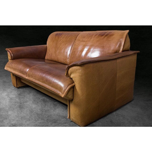 A sofa made by high-end Dutch brand Leolux in the 1970s, featuring thick neck leather upholstery, with beautifully...