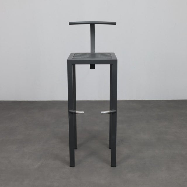 A striking pair of sarapis bar stools designed by philippe starck for aleph driade in 1986. These sculptural stools...