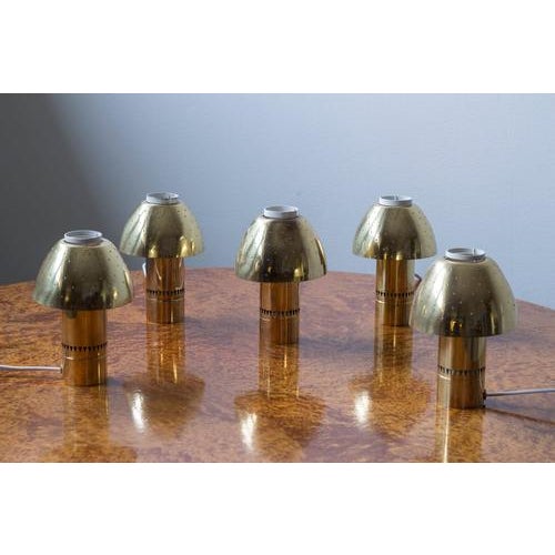 Brass table lamp model "flora" designed by hans-agne jakobsson. Produced by his own company in markaryd, sweden during the...