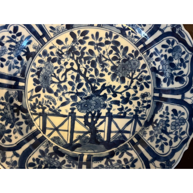Chinoiserie Antique 18th Century Chinese Kangxi Blue and White Porcelain Plate Decorated With Flowering Prunus Tree and Garden Fence For Sale - Image 3 of 11