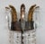 An elegant iron and crystal wall sconce or lantern by Niermann Weeks. The sconce is made of solid metal and crystals in a...