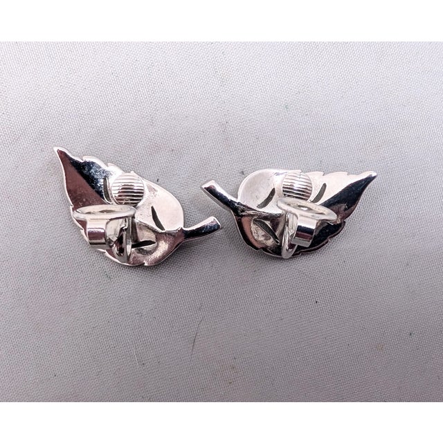Metal Vintage 1960 Signed Crown Trifari Rhodium Plated Clear Rhinestone Curled Leaf Clip Earrings-2 Pieces For Sale - Image 7 of 7
