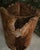 Hand-carved in the 1930s, this rustic folk art sculpture features a deeply expressive face rendered in solid wood. The...