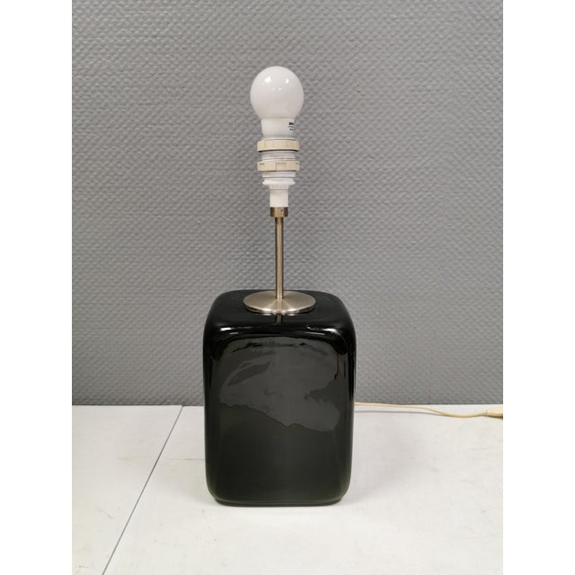 Kubus table lamps in olive green glass. Designed by Per Lütken for Holmegaard Denmark 1976. These lamps are very rare and...