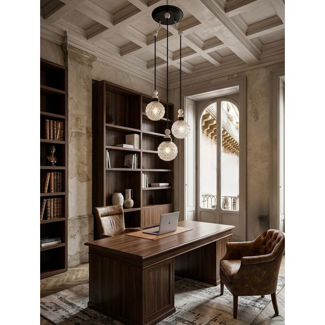 Bring home a piece of Italy’s mid-century golden age. This exquisite multi-globe chandelier is a testament to the...