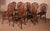 Lovely set of 10 19th-century English Windsor chestnut wheelback chairs. Very beautiful wheelback model with a decorative...