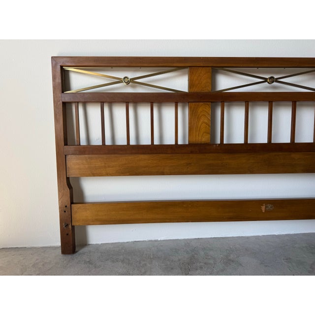 Striking and architecturally refined, this 1960s Baker king-size headboard is a classic example of Hollywood Regency...