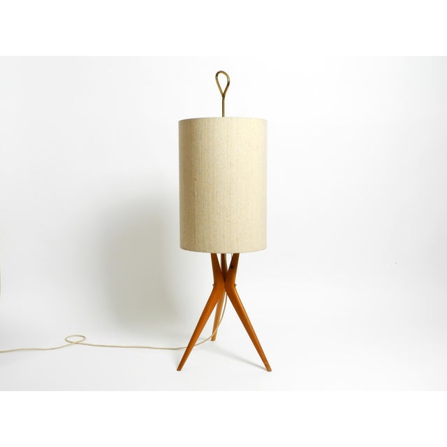 Beautiful mid century modern tripod floor lamp with solid walnut wood legs and large original fabric shade. very rare,...
