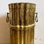 A striking vintage Italian brass umbrella stand featuring a beautifully sculptural, hand-worked design with a fluted body,...