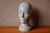 This glazed ceramic mannequin head perfectly illustrates the spirit of 1970s design, when clean lines became decorative...
