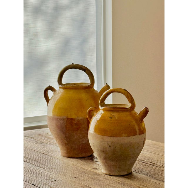 French 19th Century Antique Glazed Yellow Confit, Cruche Pot, Gargolette With Top Handle and Spout- A Pair. Richly colored...