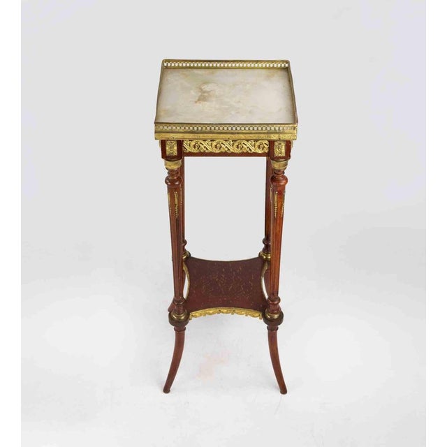 Ancient Altana Empire Style realized in the late 19th Century. Wood and gilded metal. Very good condition.