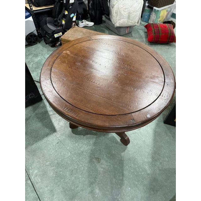 Beautiful vintage round pedestal table with classic, timeless appeal. Crafted from solid wood, this table features a thick...