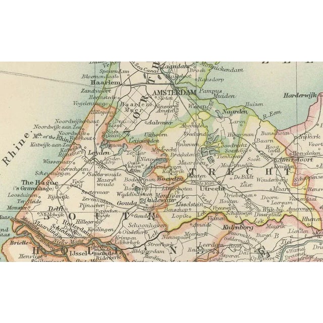 Antique Map of Belgium and The Netherlands, 1903, with Delicate Pastel Coloration This antique map, titled "Belgium and...