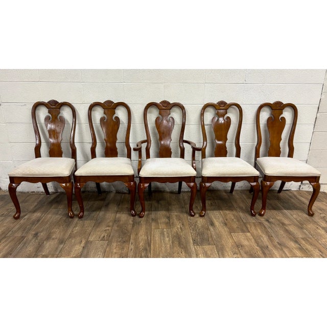 This is an absolutely gorgeous set of five vintage Universal Furniture Queen Anne style dining chairs, including one arm...