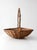 Sculptural antique willow gathering basket with a broad, shallow profile and tall natural branch handle. Beautifully...