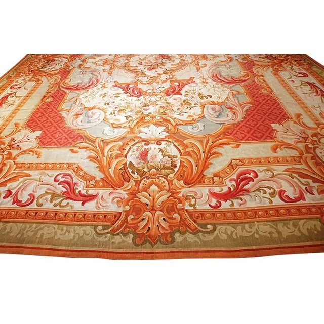 Antique Aubusson French Large Wool Flat Weave Coral Rug, Country of Origin: France, Circa Date: 1850s. This magnificent...